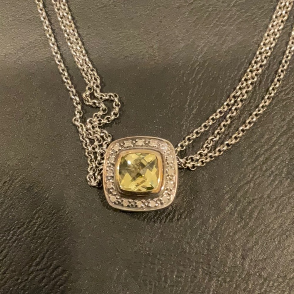 Silver, gold, diamond, and green stone necklace